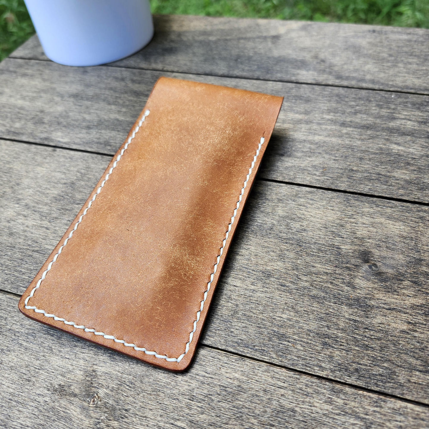 Handmade Leather Case showcasing the back side of the case in olmo pueblo leather