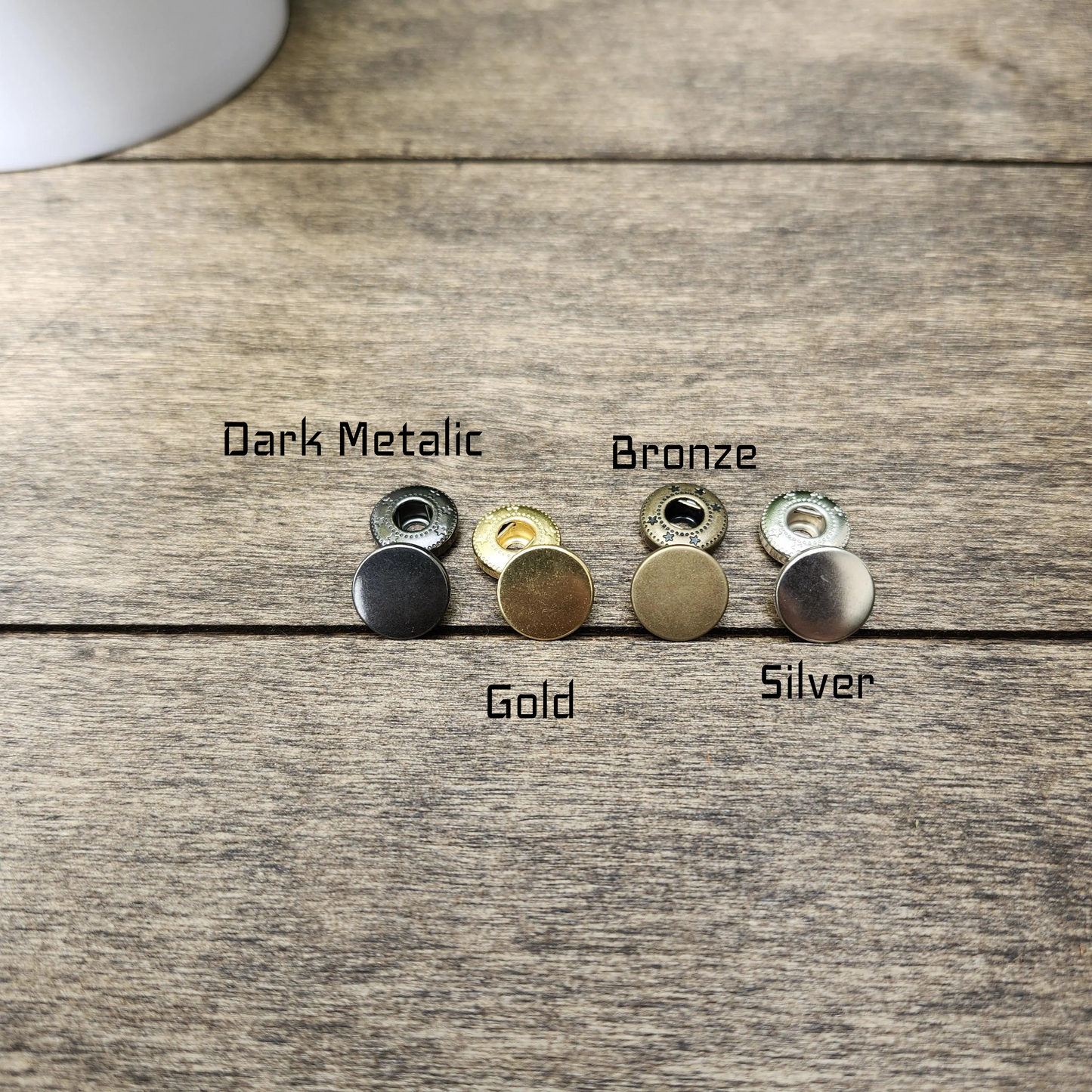 Selection of Snap Fastners in dark metallic, gold, bronze and silver