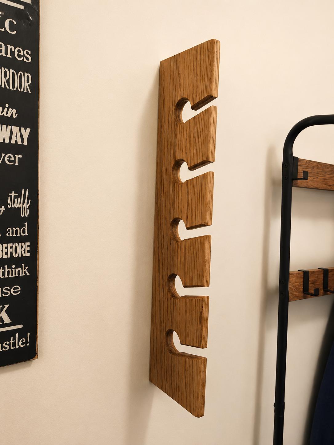 Natural-finish oak hat rack with visible wood grain