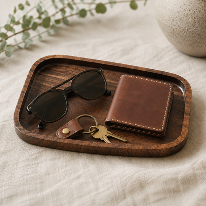 Handmade walnut valet tray holding glasses, wallet, and keys