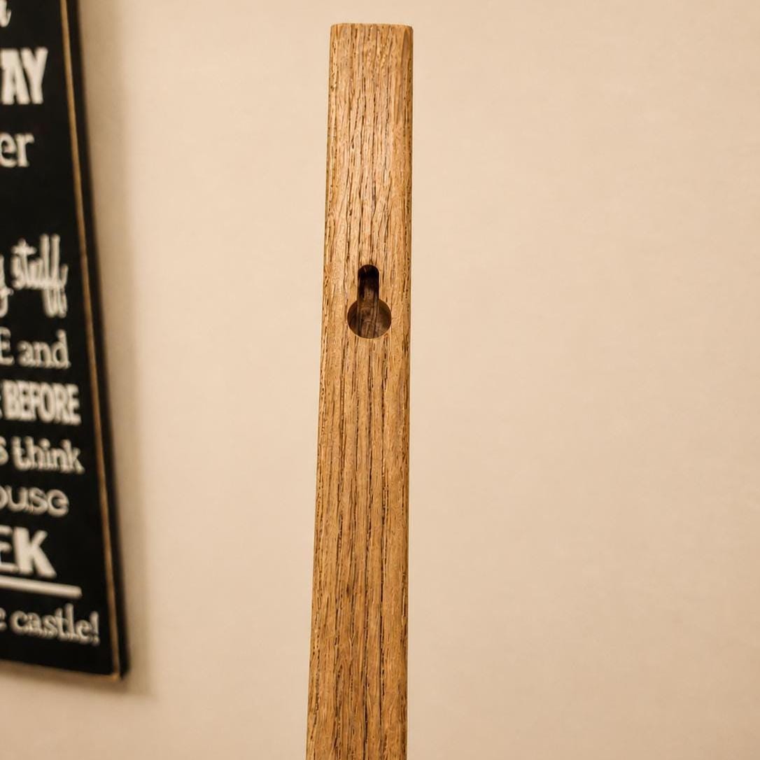Recessed keyhole mounting point on the back of the wooden hat rack